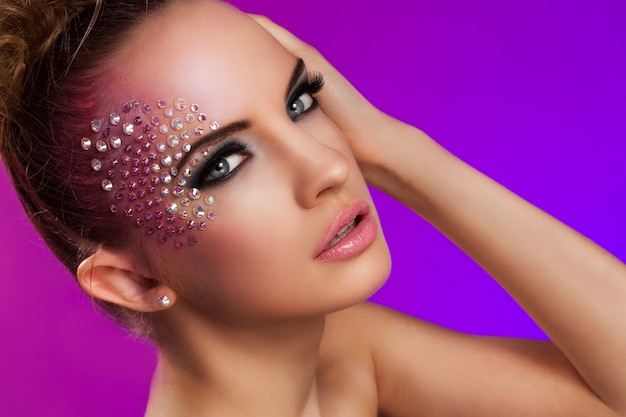 Free Photo beautiful woman with fantasy makeup