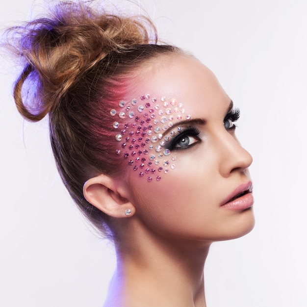 Beautiful woman with fantasy makeup