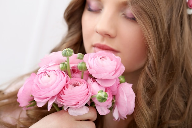 Beautiful woman with flowers