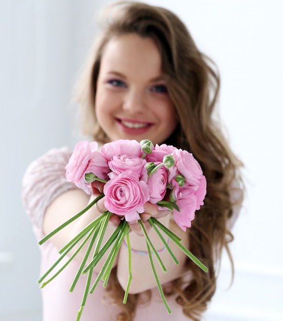 Beautiful woman with flowers