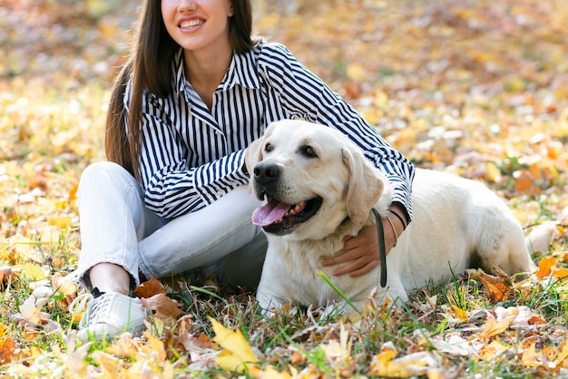 Beautiful woman with her cute dog