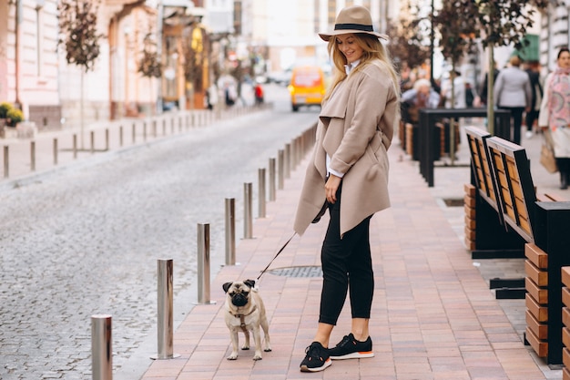 Beautiful woman with her dog