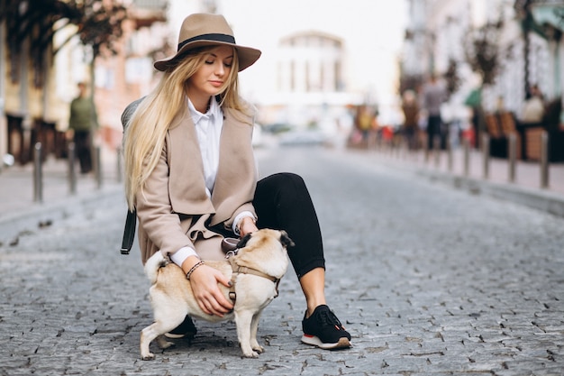 Free photo beautiful woman with her dog