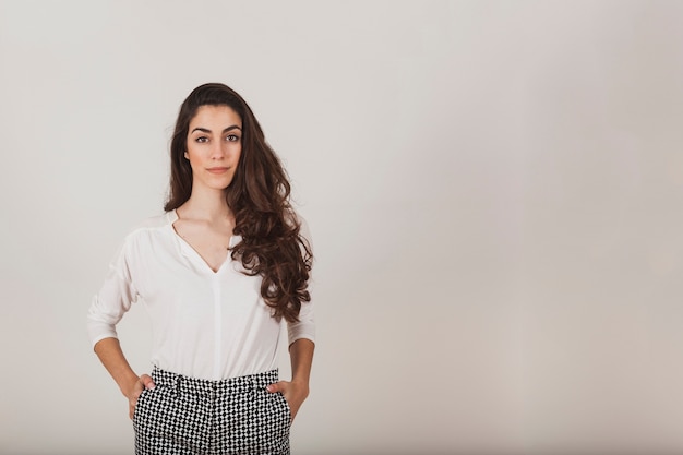 Beautiful woman with long hair and white shirt