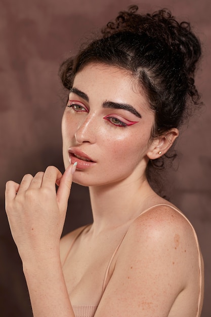 Beautiful woman with red eyeliner