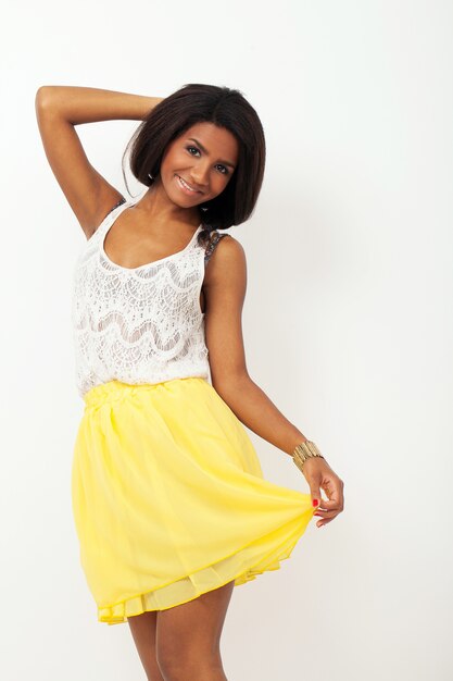 Beautiful woman in a yellow skirt