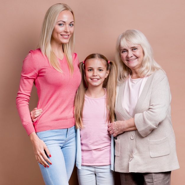 Free photo beautiful women generation: granny, mother and daughter