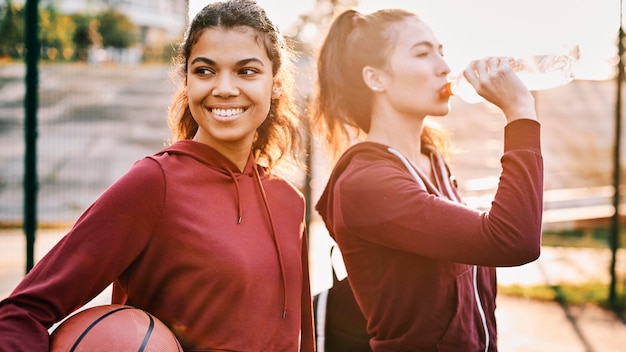 Beautiful women walking home after a basketball game