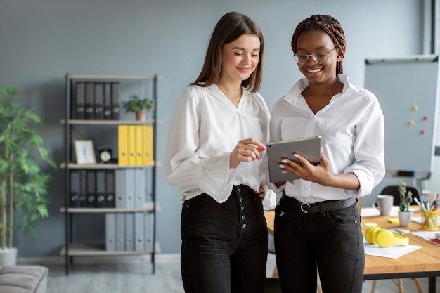 Beautiful women working together in a startup company