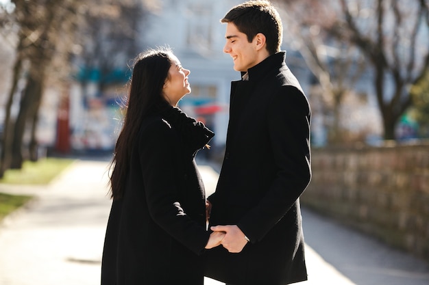 Beautiful young couple meets in the city