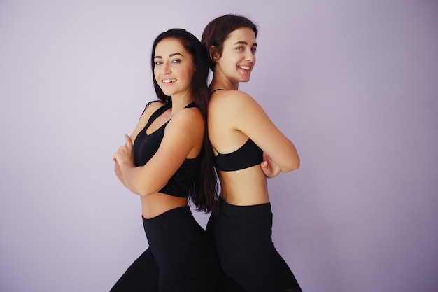 Beautiful and young girls in a gym