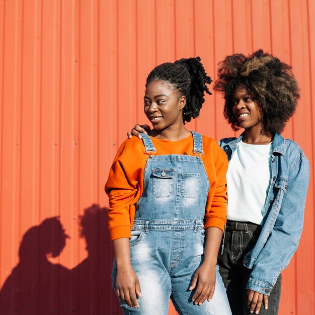 Beautiful young girls looking away