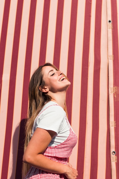 Beautiful young woman in the amusement park