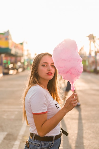 Beautiful young woman in the amusement park