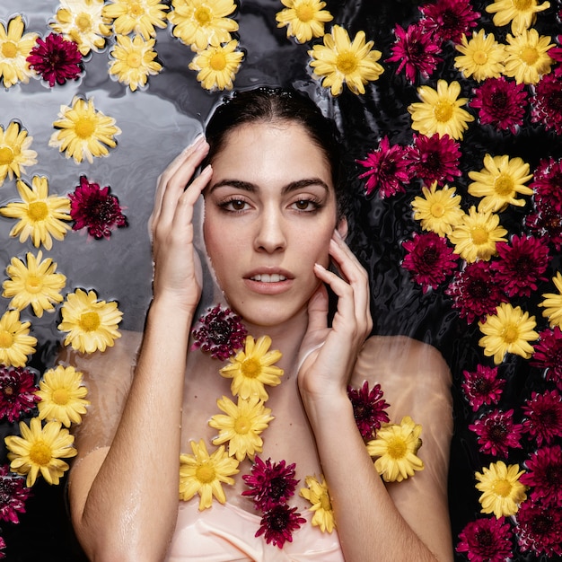 Beautiful young woman enjoying spring bath