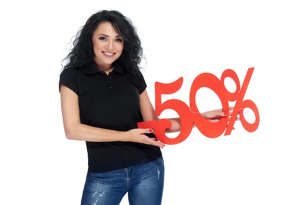 Free Photo beautiful young woman holding percentage sign of discount