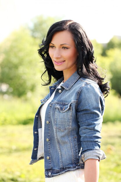 Beautiful young woman in a park