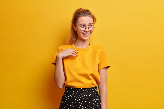 Beautiful young woman portrait wearing glasses isolated