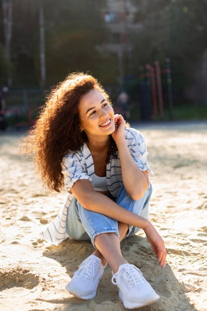 Beautiful young woman posing and smiling