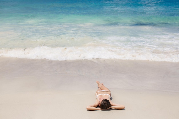 Free photo beautiful young woman on the seychelles beach