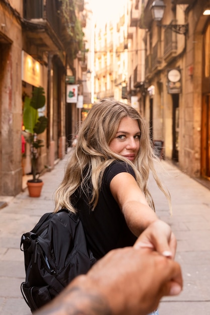 Free Photo beautiful young woman sightseeing