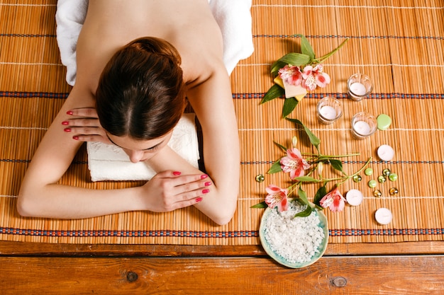 Beautiful young woman at a spa salon