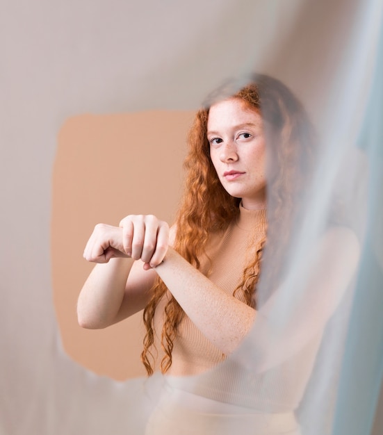 Beautiful young woman teaching sign language