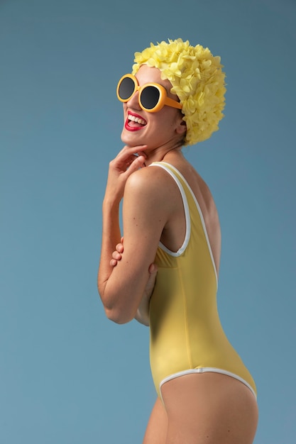 Beautiful young woman with swimming cap