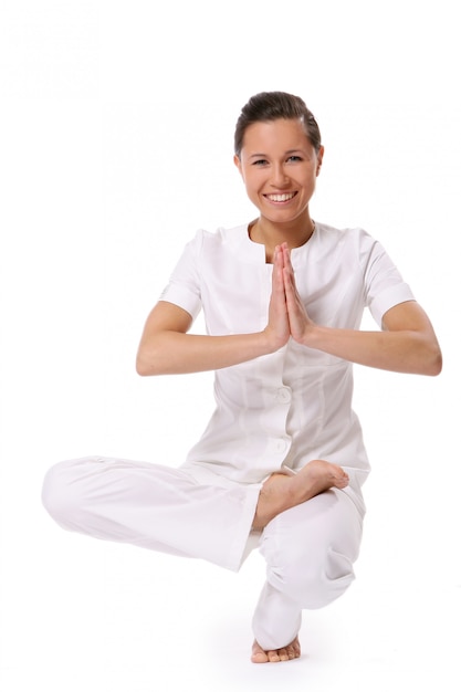 A beautiful young woman in yoga pose