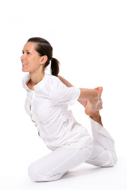 A beautiful young woman in yoga pose