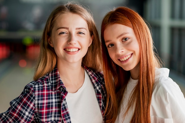 Beautiful young women posing in a bowling club