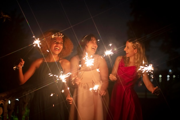 Free photo beautiful young women in their graduation night