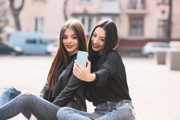 Beautifull girls taking a photo