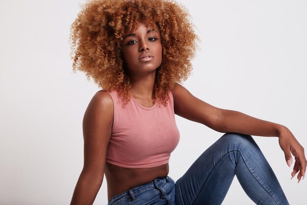 Beauty black woman with big afro hair in studio shoot