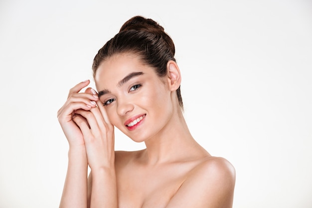 Beauty portrait of adorable half-naked woman with perfect skin looking