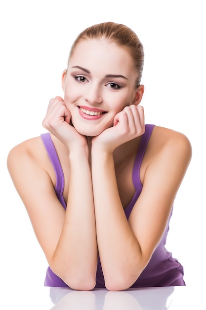 Beauty Portrait. Beautiful Spa Woman Touching her Face.