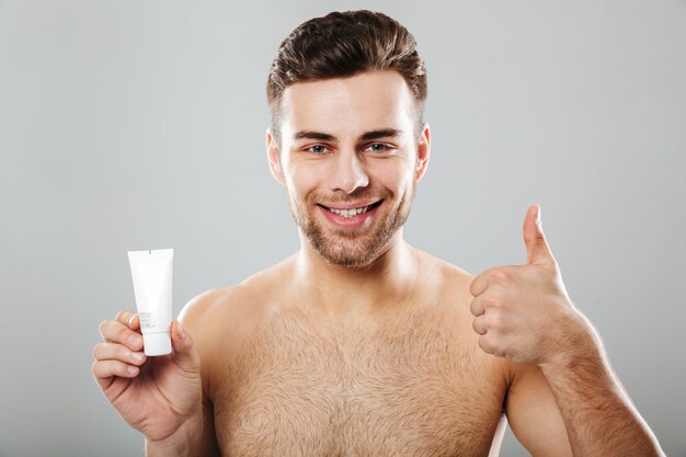 Beauty portrait of a smiling half naked man