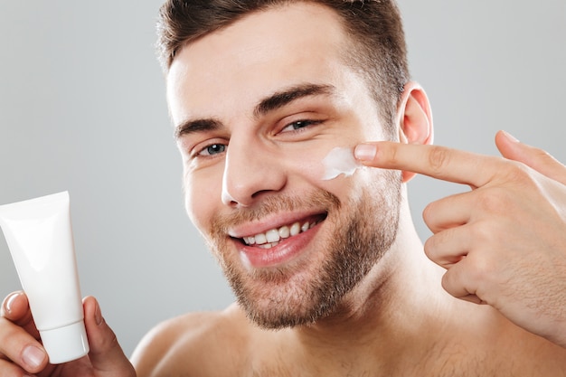 Beauty portrait of a smiling half naked man