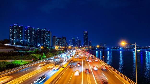 Beautyful of traffic in Seoul at night and cityscape, South Korea with motion blur