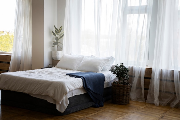 Free photo bedroom decor with potted plants