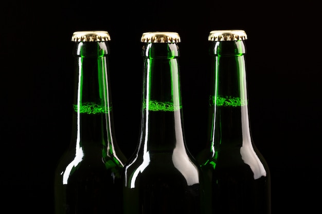 Free Photo beer bottles standing on a row