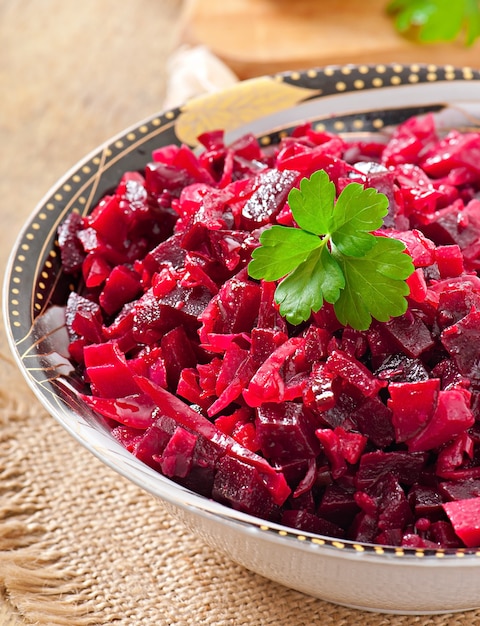 Free photo beet salad vinaigrette in a wooden bowl