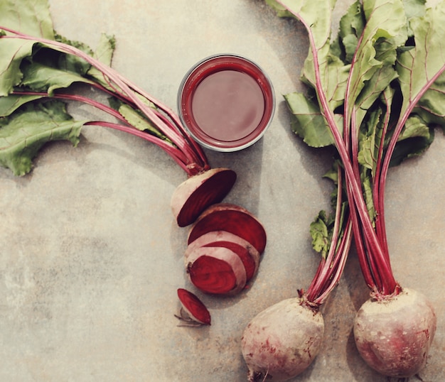 Free Photo beetroot juice on wooden table