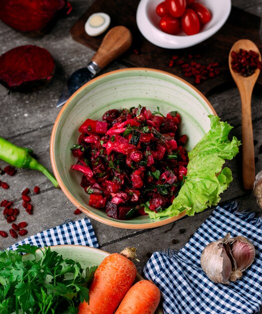 Beetroot salad with beets and beans on the table