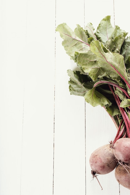 Beetroot on white wooden table.