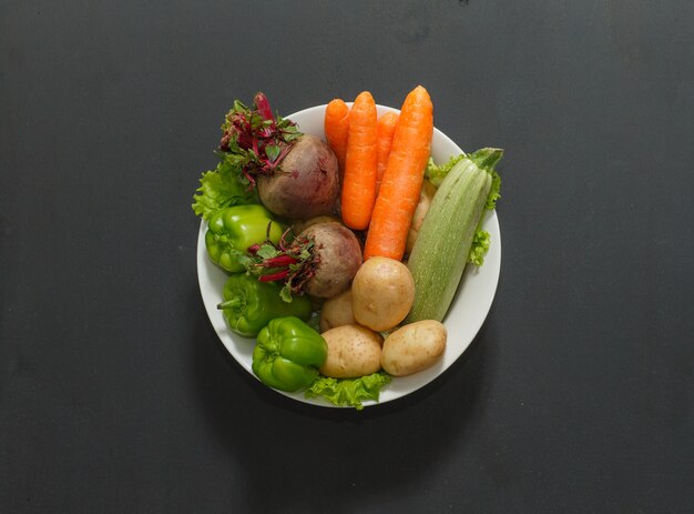 Beetroots, zucchini, carrots and green peppers with letucce leaf