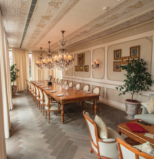 A beige colored interior dining room.