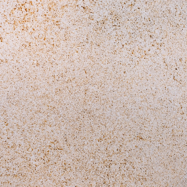 Free photo beige grained texture for background