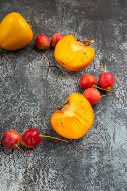 berries the appetizing cherry persimmons are laid out in a circle