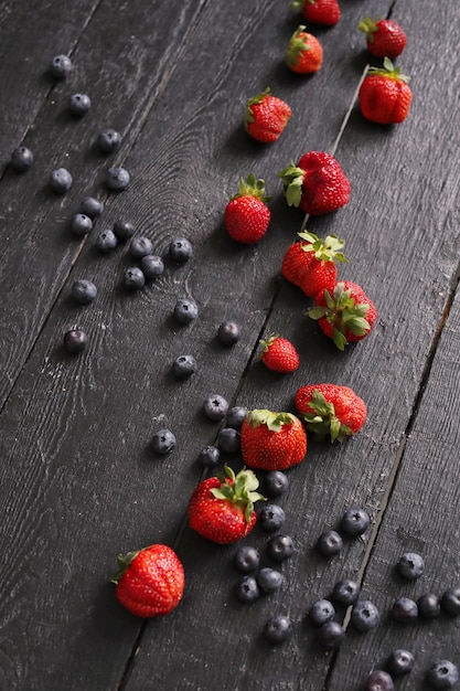 Free photo berries on the wooden table